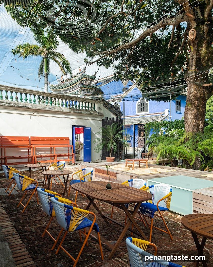 Outdoor Patio with Blue and White Building