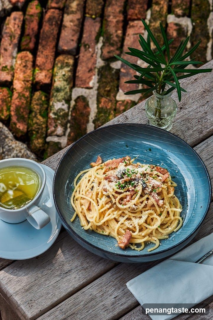 Pasta with Tea on Wooden Table