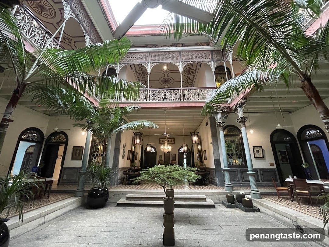 Interior Courtyard with Palm Trees and Balcony