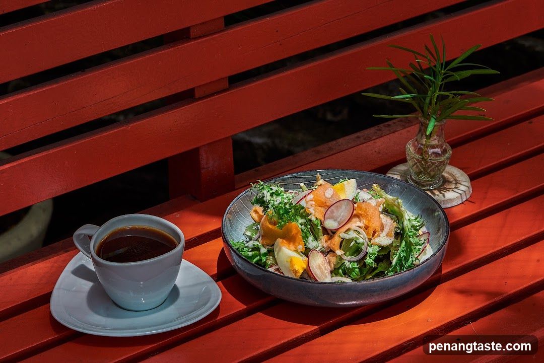 Salad and Coffee on Red Bench