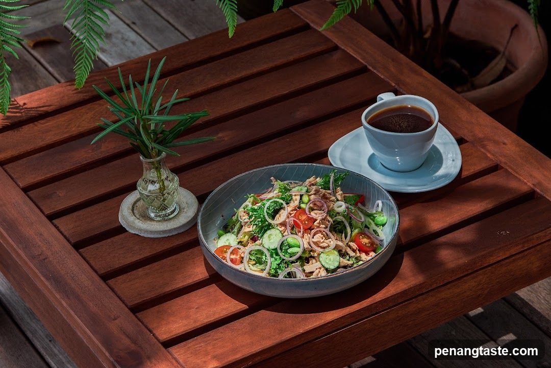 Outdoor Meal Setting with Salad and Coffee