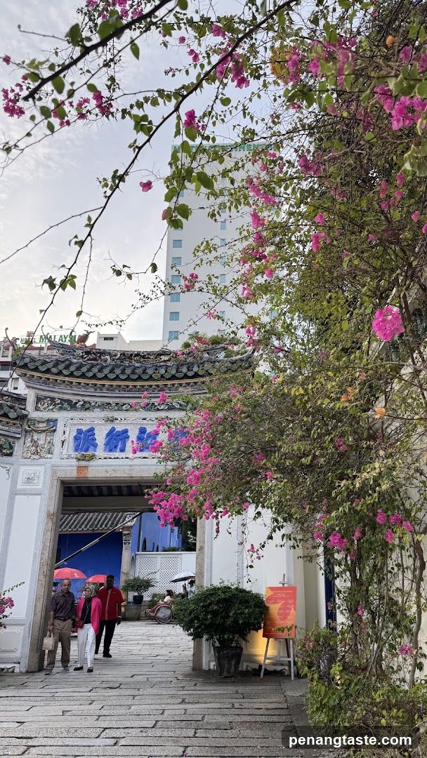 Entrance with Bougainvillea and Signage