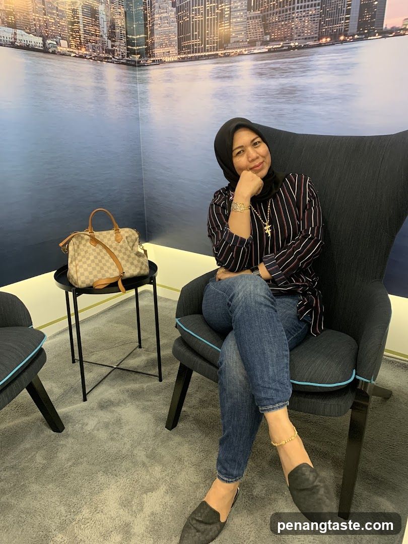 Woman in Chair with Handbag