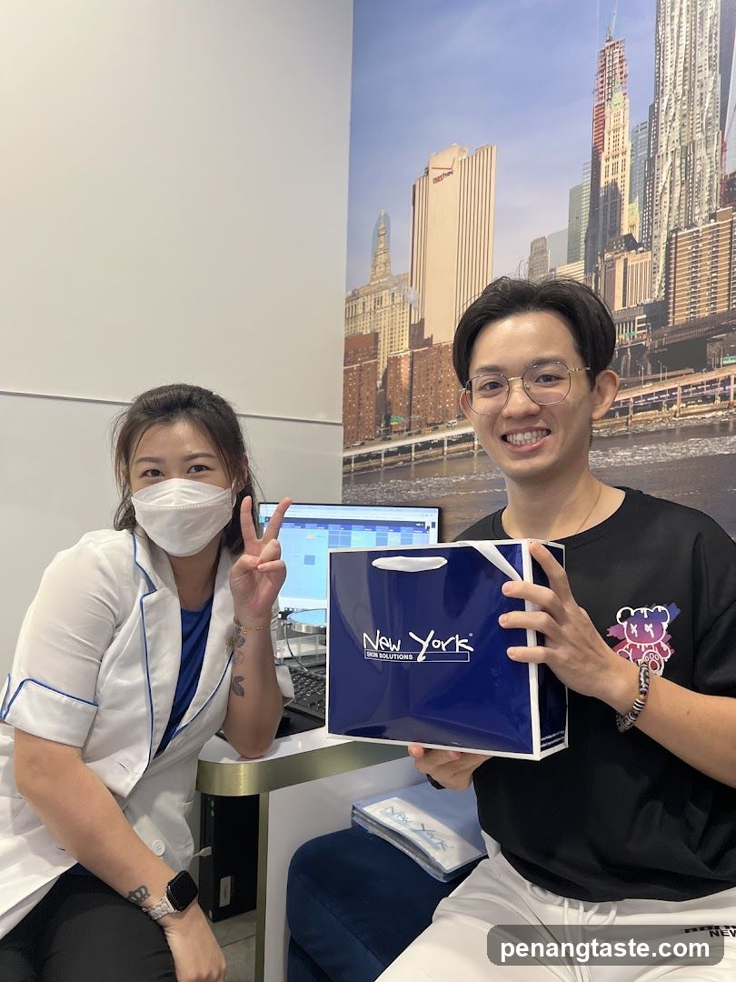 Client and Staff with Gift Bag