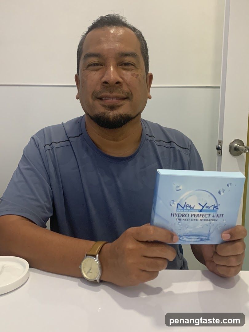 Man holding New York Hydro Perfect Kit