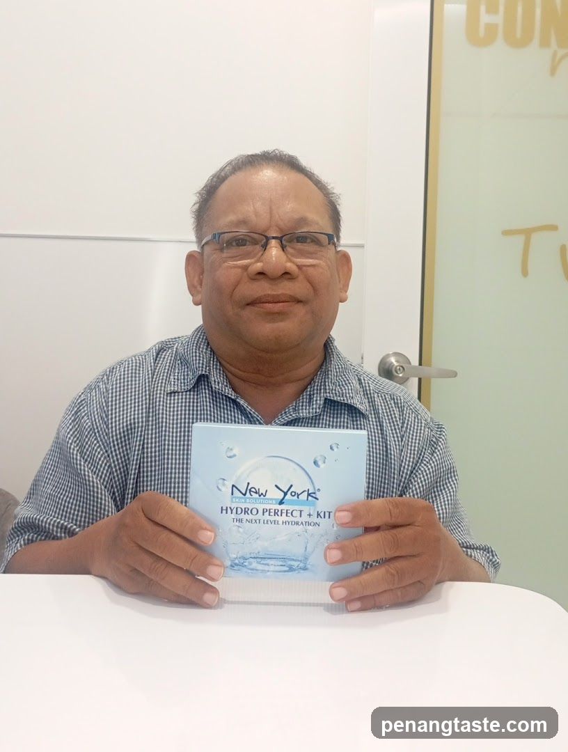 Man holding skincare product box