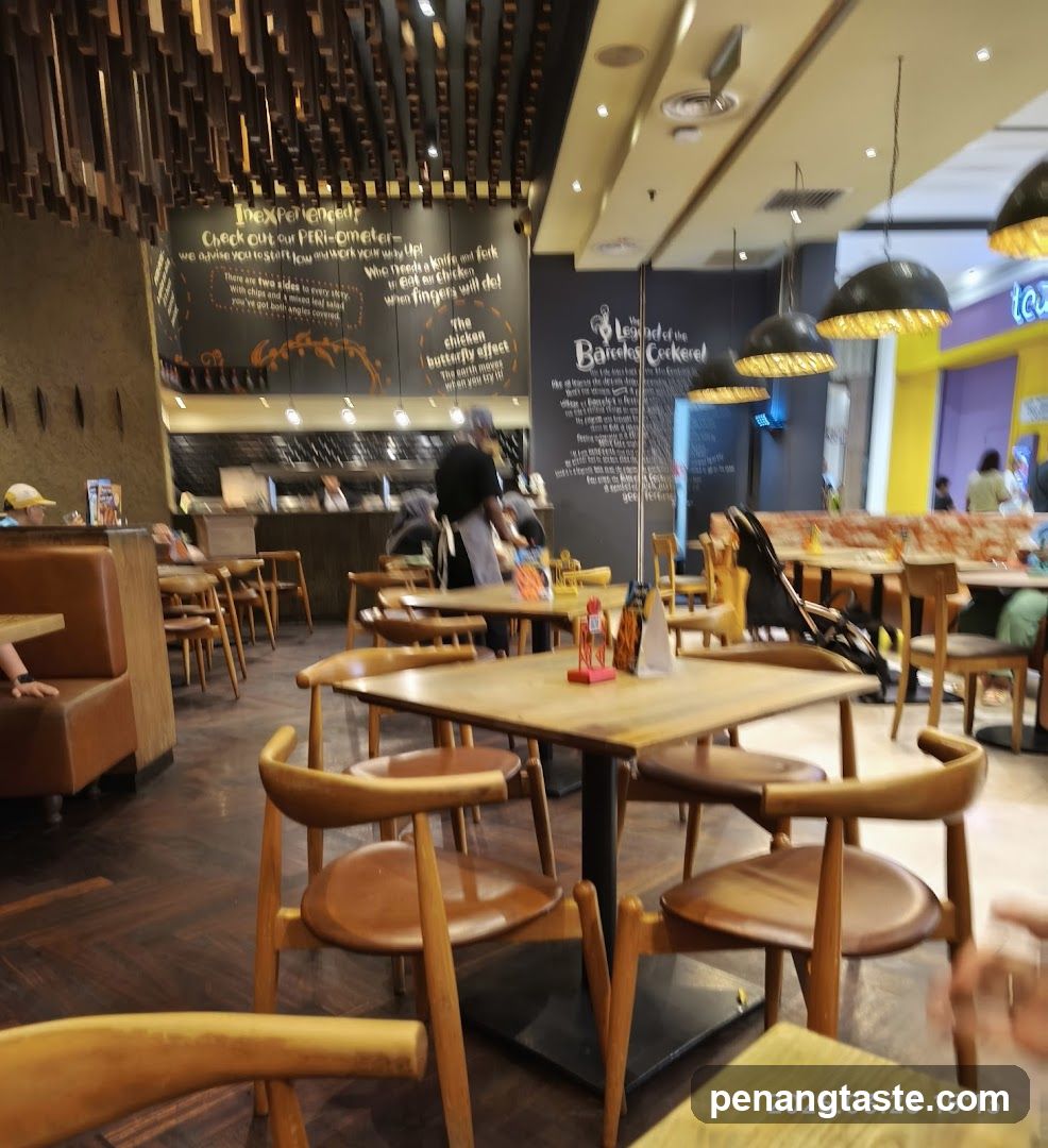 Restaurant Interior with Wooden Tables and Chalkboard Menu