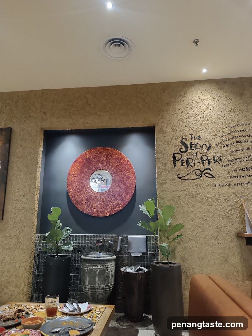 Interior of a restaurant with decorative wall art and dining setup
