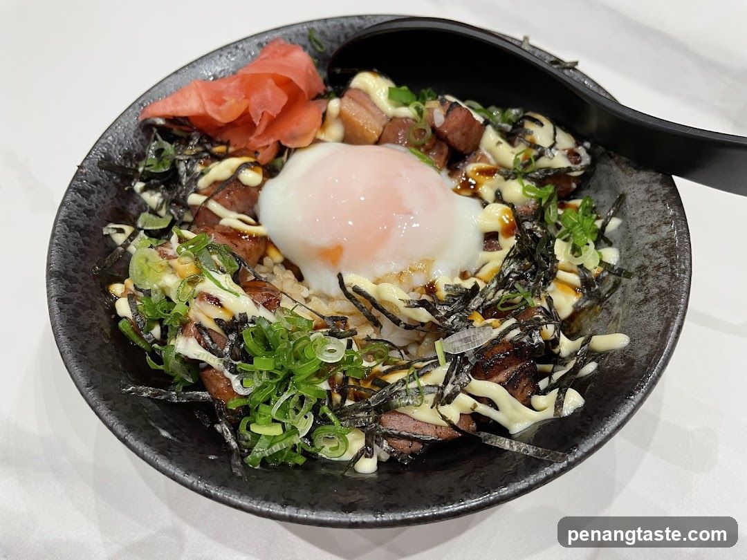 Bowl of Grilled Meat Rice with Egg and Toppings