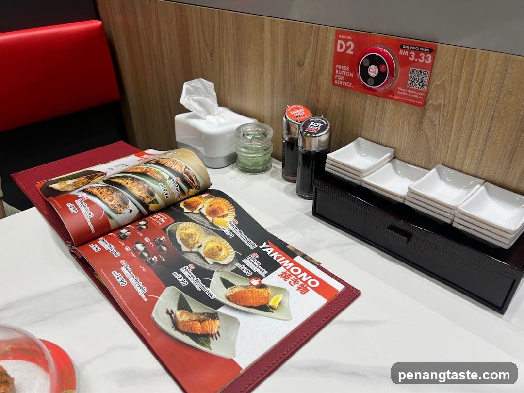 Restaurant Table Setting with Menu and Condiments