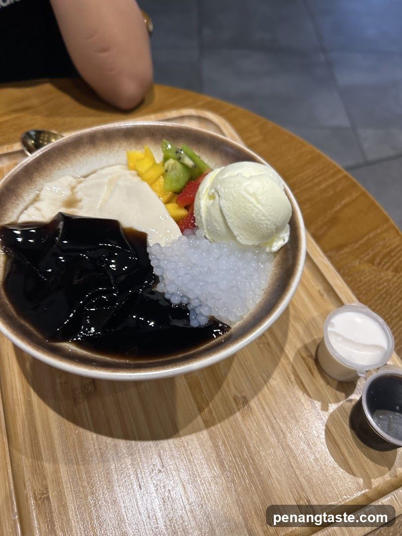 Fruit Dessert Bowl with Ice Cream and Syrup