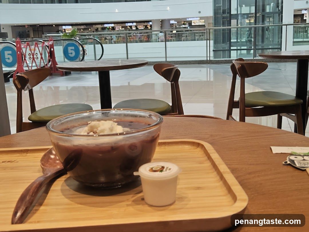 Dessert in a glass bowl at a mall cafe