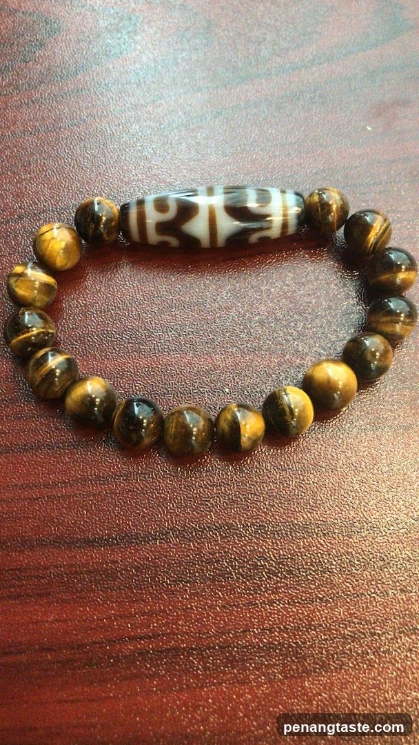 Beaded Bracelet on Wooden Surface
