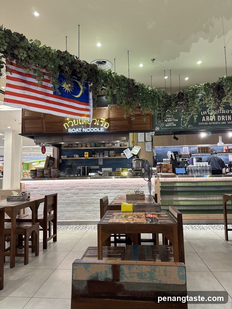 Restaurant Interior with Malaysian Flag and Greenery Decor