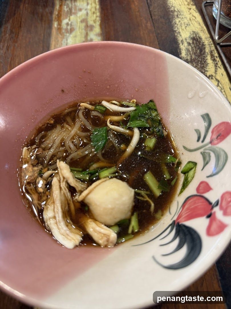 Bowl of Noodle Soup with Fish Ball and Vegetables