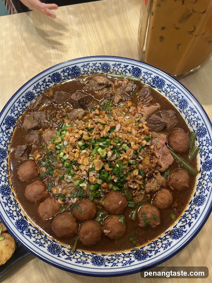 Bowl of Meatball Soup with Garnish