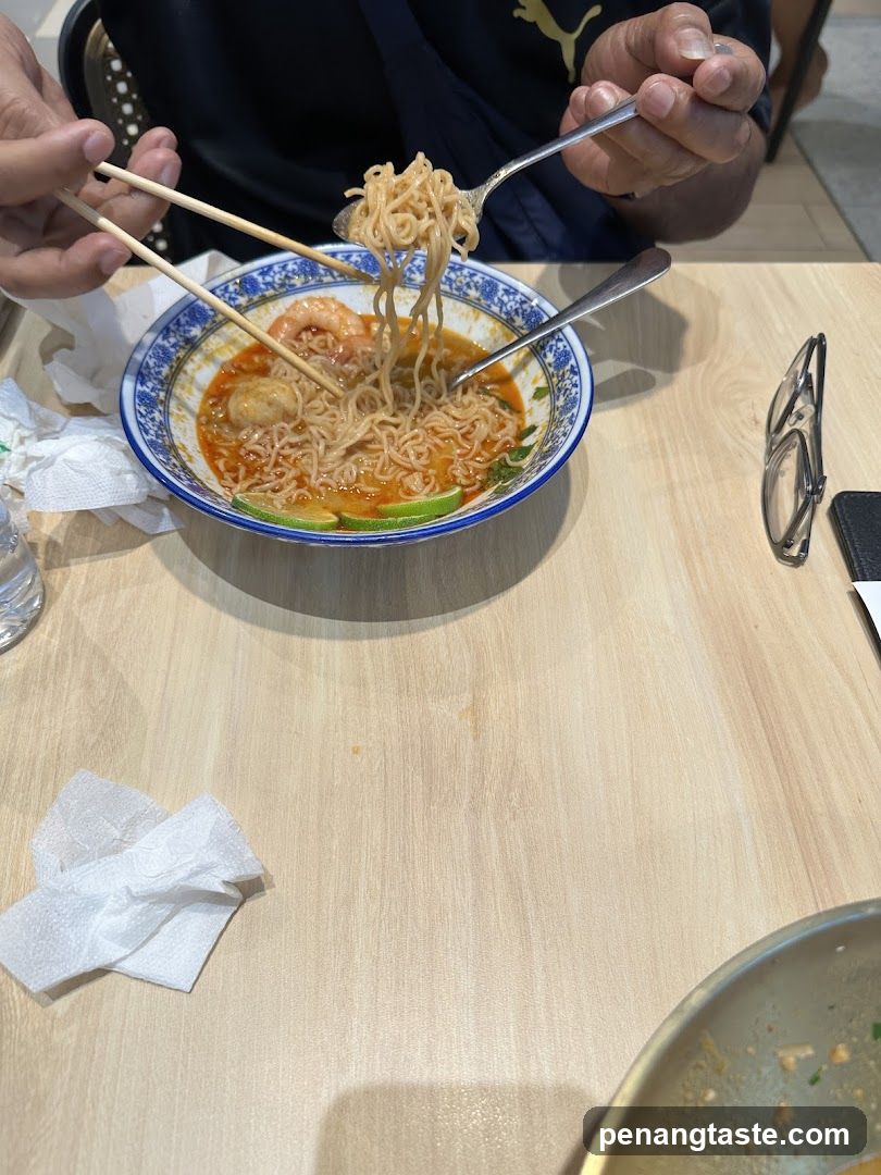 Noodle Bowl with Chopsticks and Fork