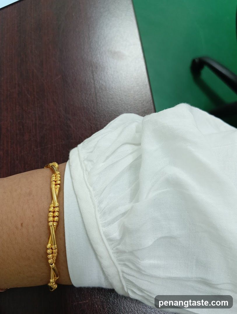 Gold Bracelet on Wrist