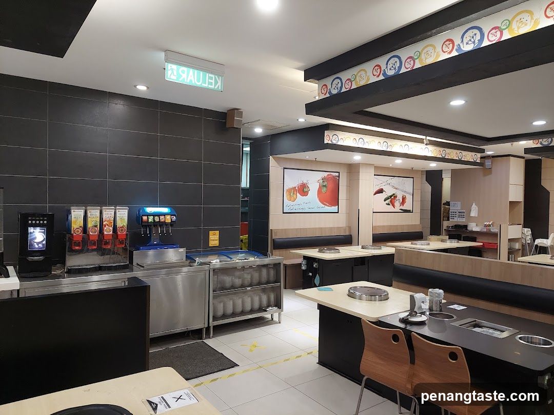 Restaurant Interior with Beverage Station and Dining Area