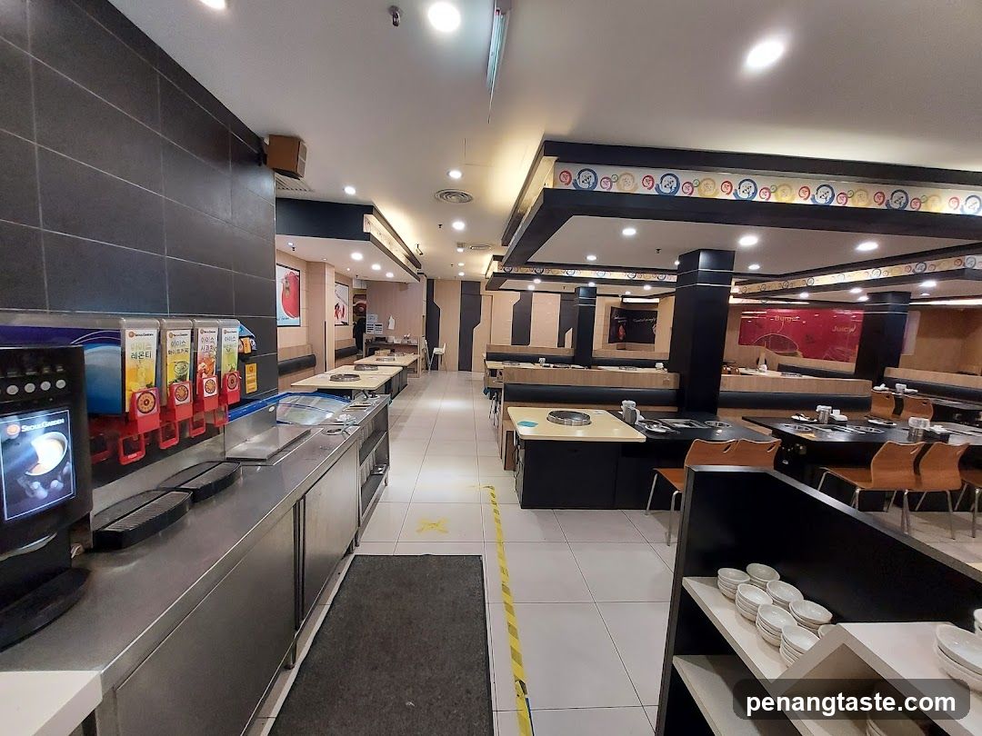 Restaurant Interior with Beverage Station and Dining Tables