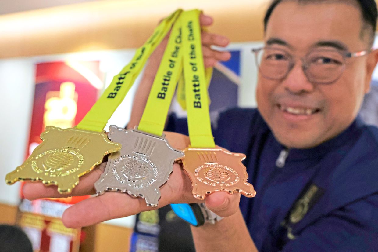 Penang Chefs Association president Audee Cheah with medals for Battle of the Chefs 2026